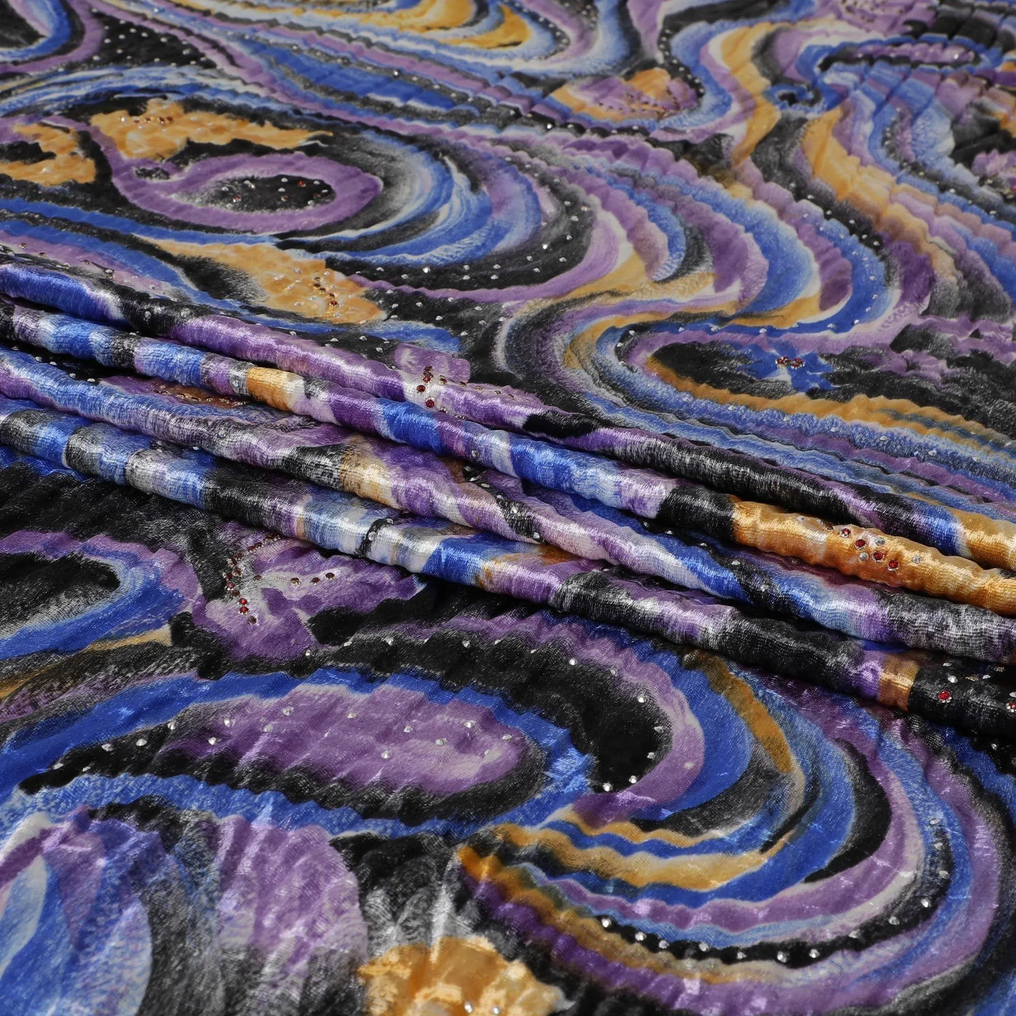 Egyptian blue to purple Rayon velvet fabric with multicolor print and metallic silver studs in fancy design